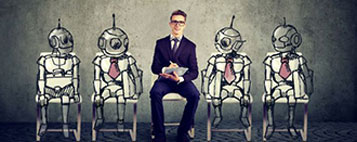 man sitting with robots